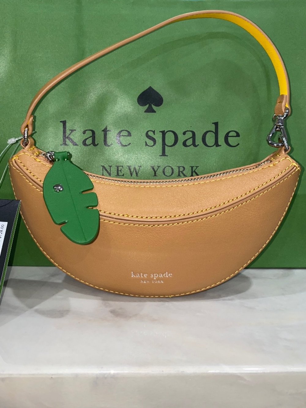 Kate Spade banana wristlet mini bag